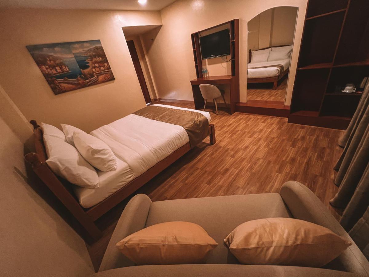 Rufana Suites Moalboal Bagian luar foto