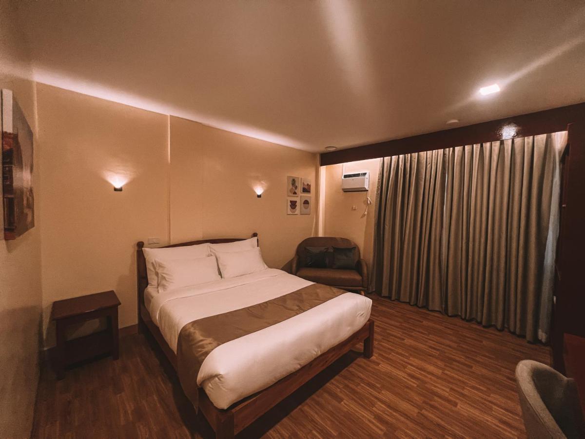 Rufana Suites Moalboal Bagian luar foto
