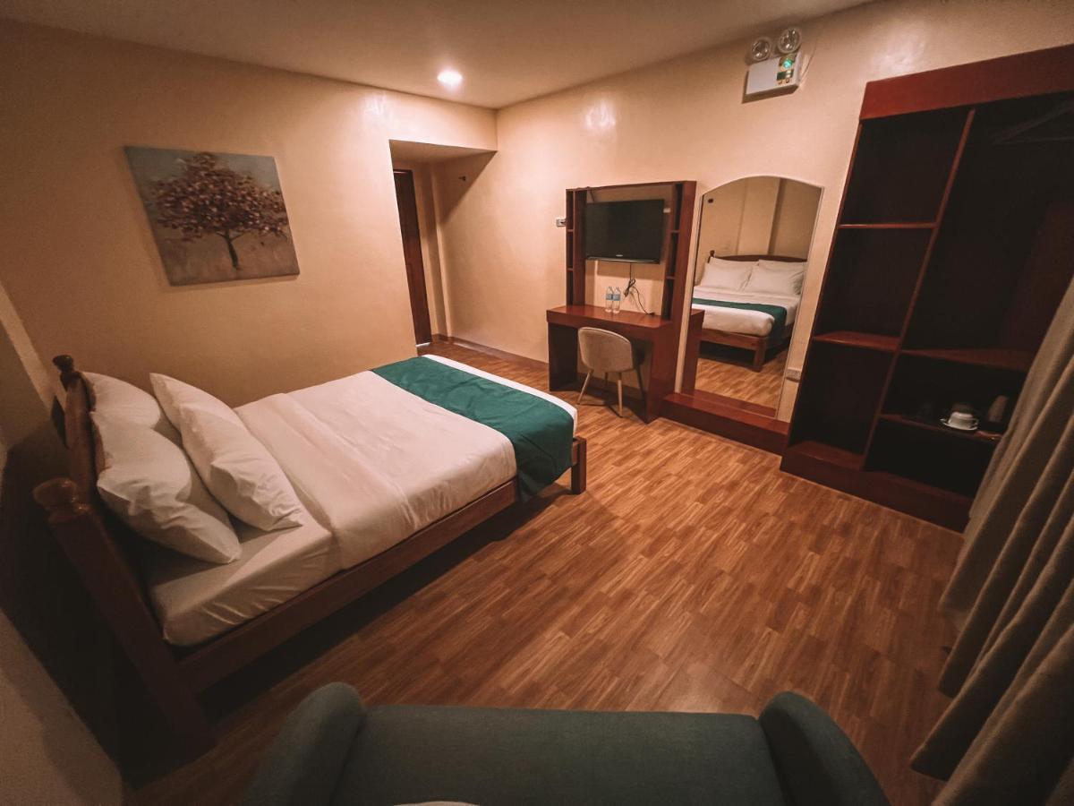 Rufana Suites Moalboal Bagian luar foto